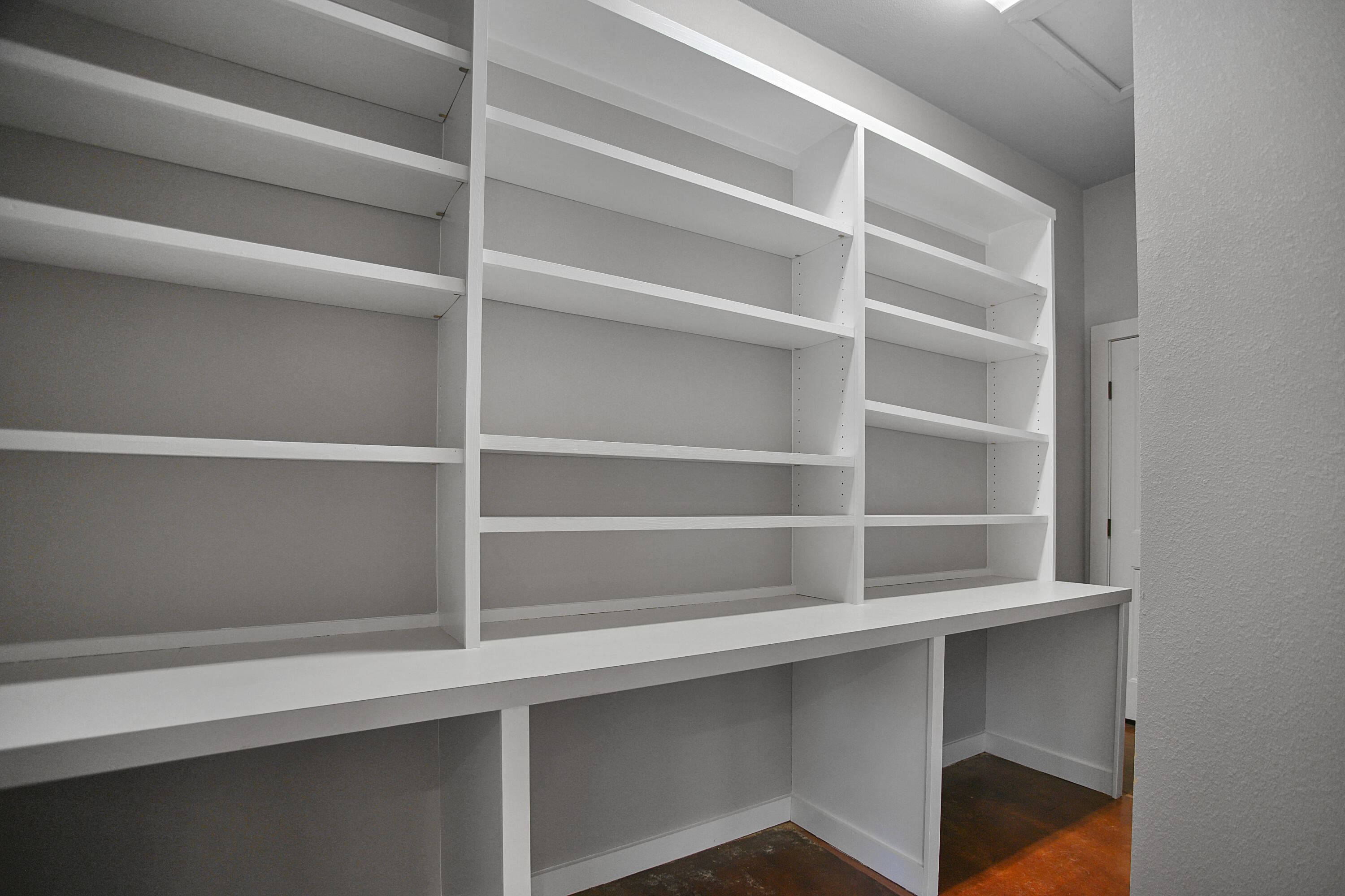 5412 20th Street Lubbock, TX 79407 - Photo 33 of 83 a view of walk in closet with empty racks
