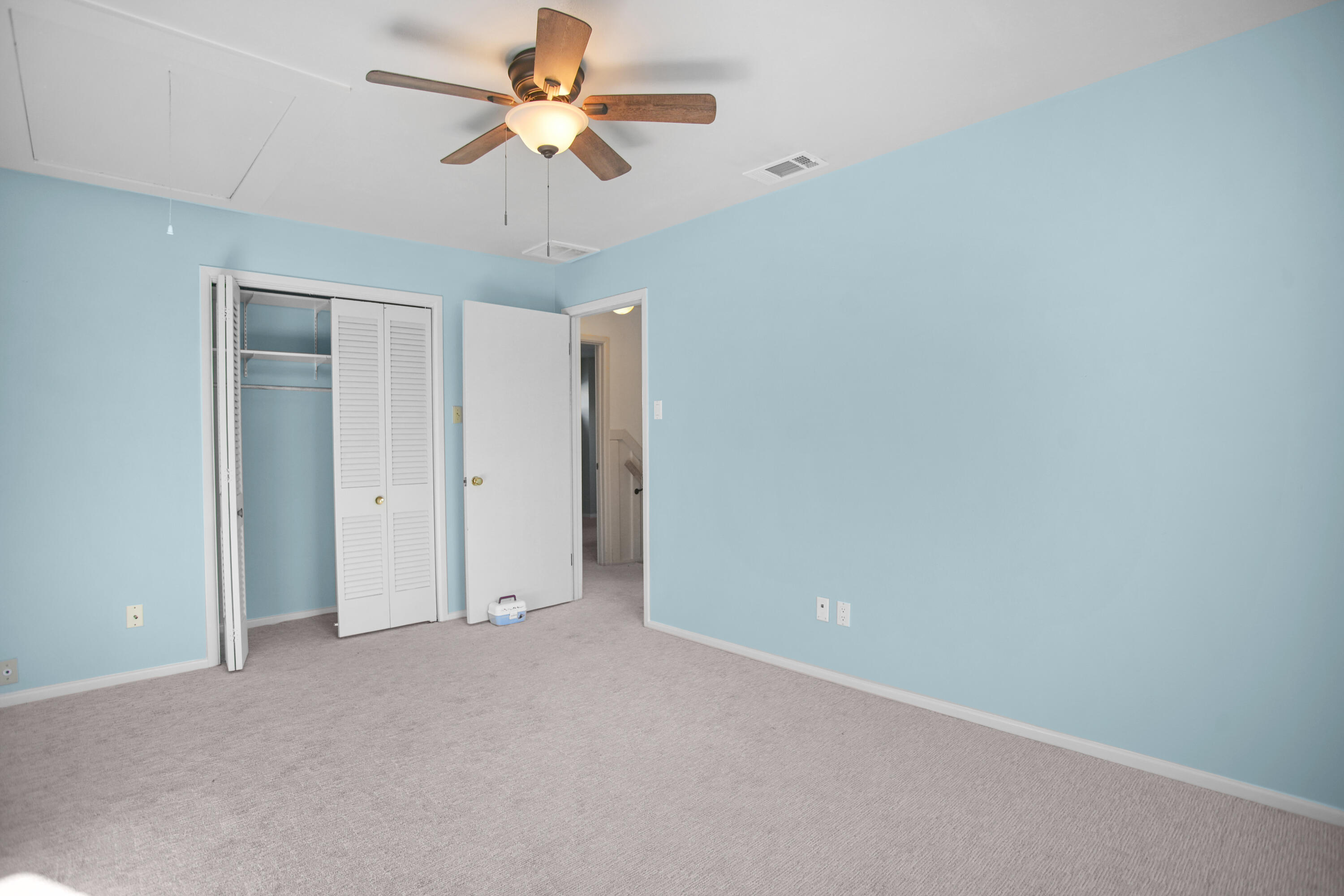 5412 20th Street Lubbock, TX 79407 - Photo 62 of 83 a view of a room with a ceiling fan and a chandelier fan