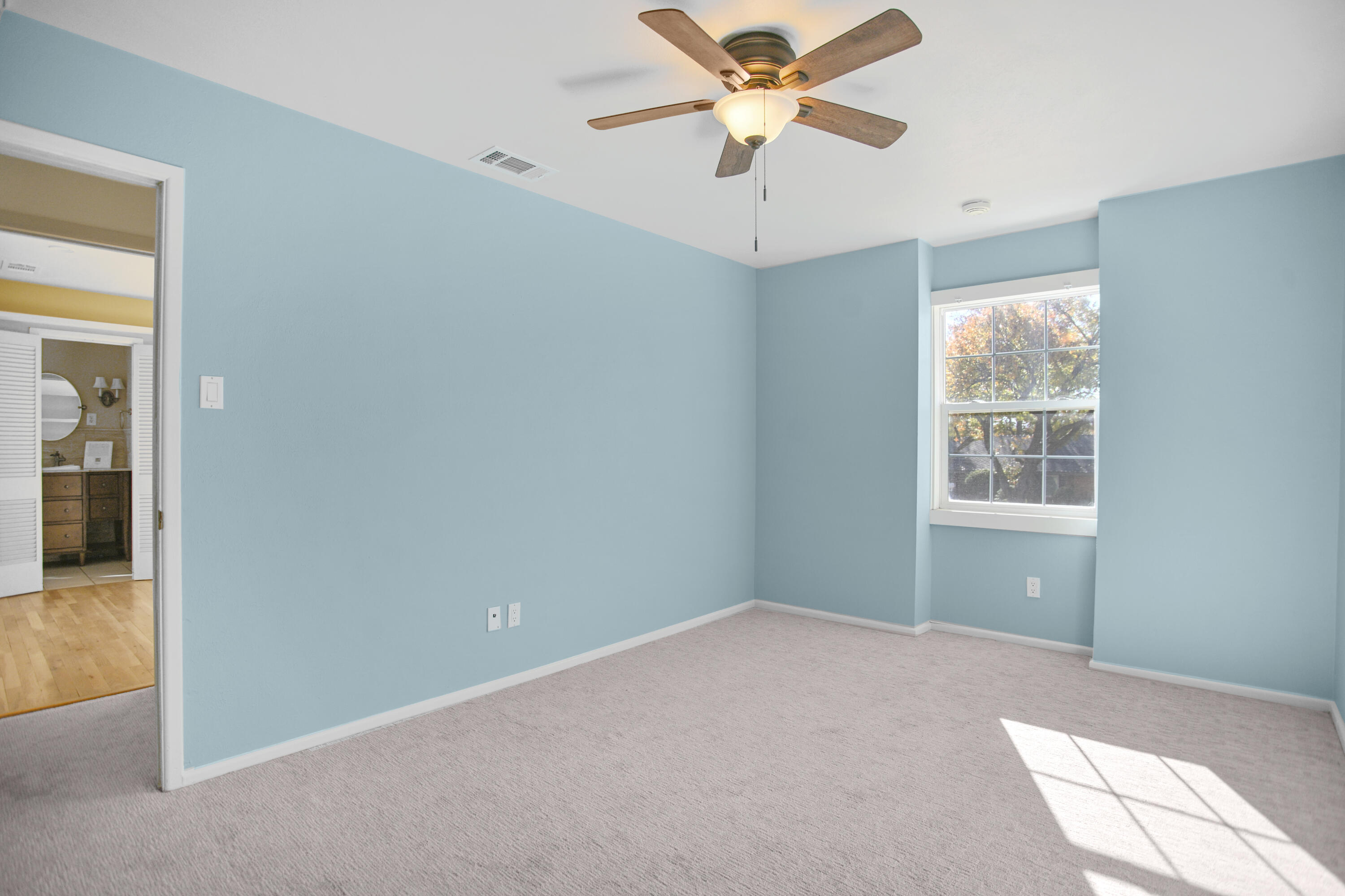 5412 20th Street Lubbock, TX 79407 - Photo 63 of 83 an empty room with windows and fan