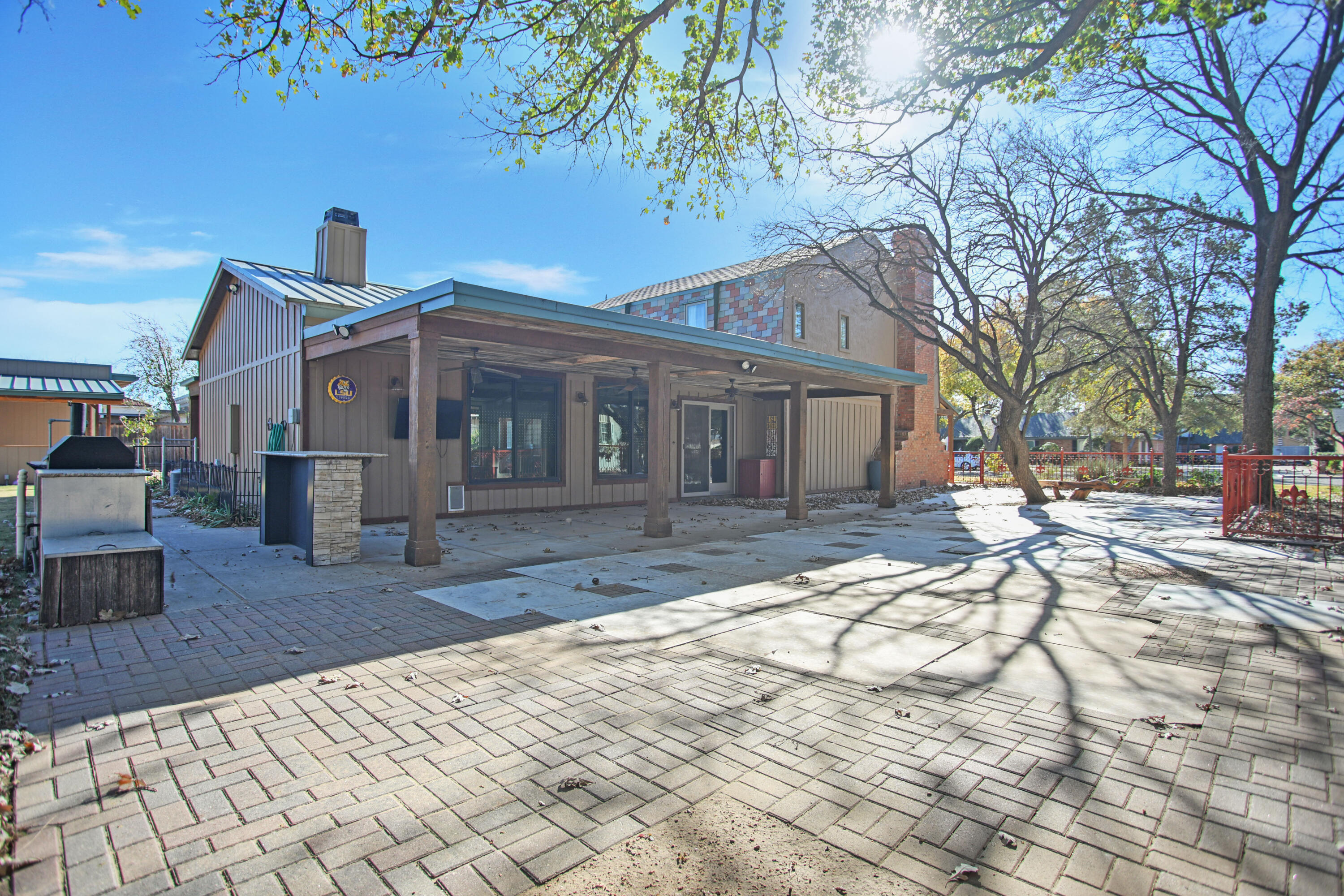 5412 20th Street Lubbock, TX 79407 - Photo 76 of 83 a front view of a house with a yard