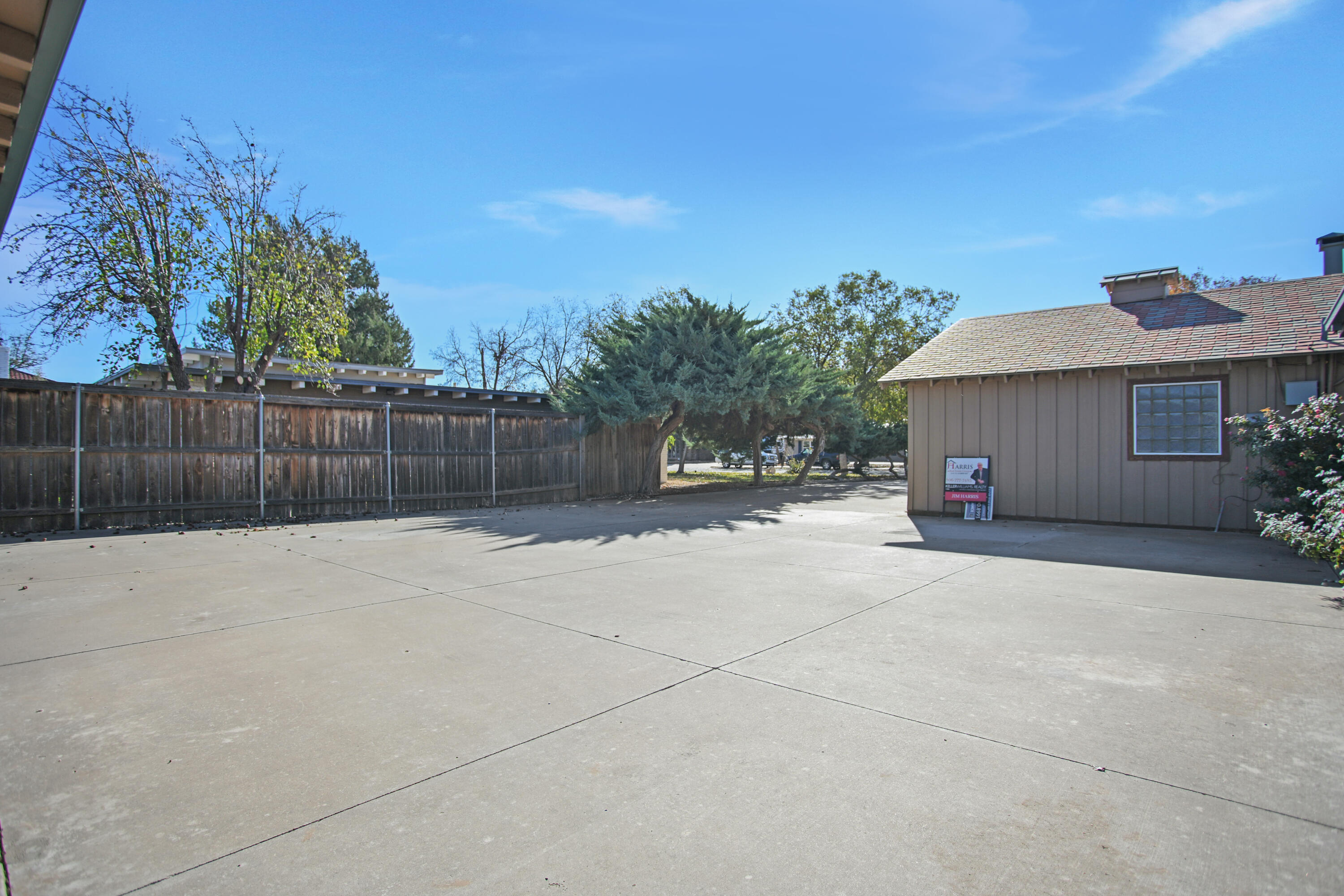 5412 20th Street Lubbock, TX 79407 - Photo 80 of 83 a view of a house with a yard and a large tree