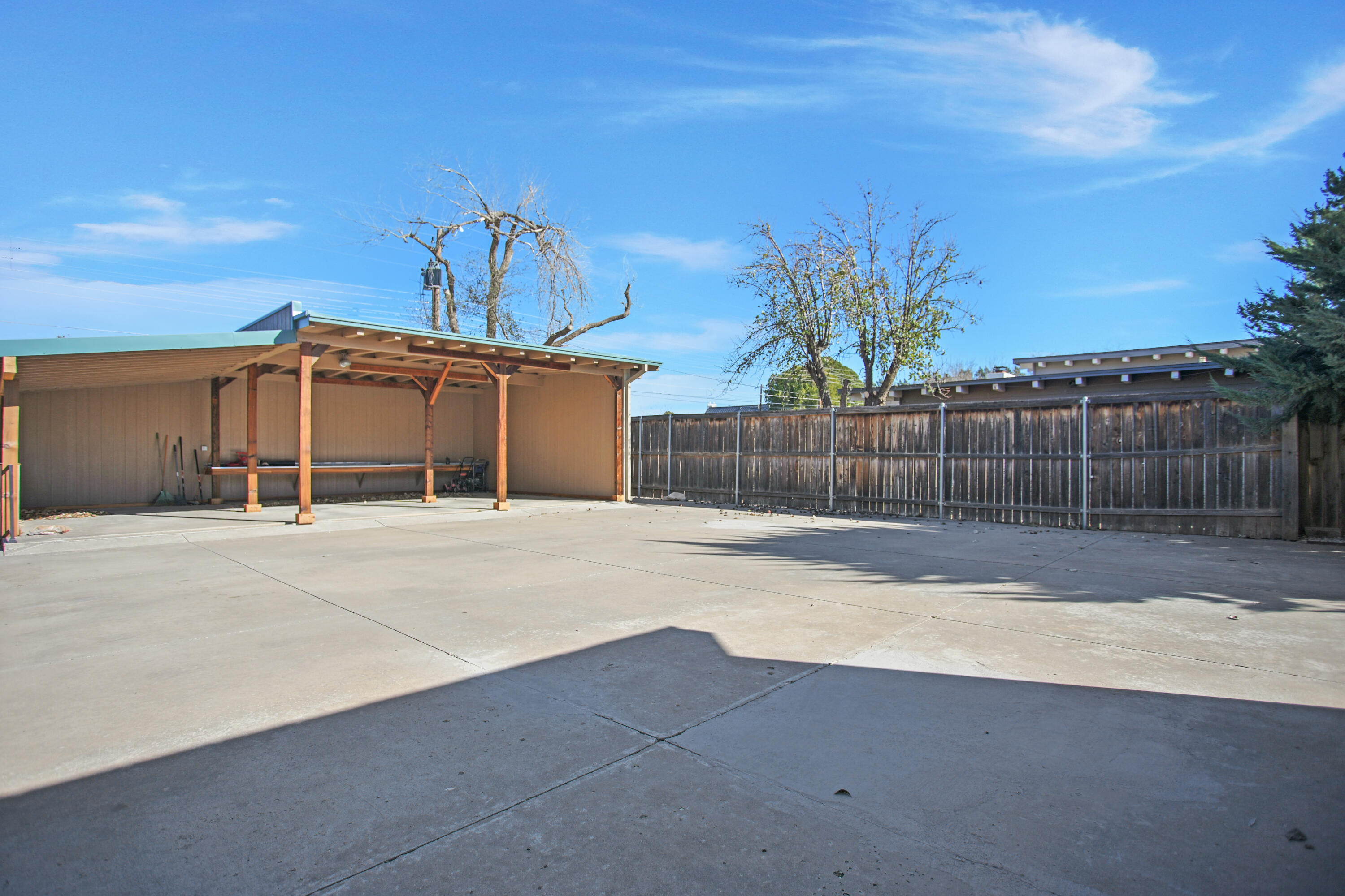 5412 20th Street Lubbock, TX 79407 - Photo 81 of 83 a front view of a house with a yard and garage