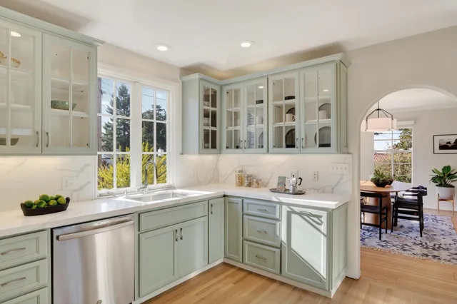 a bedroom with a bed couch and window