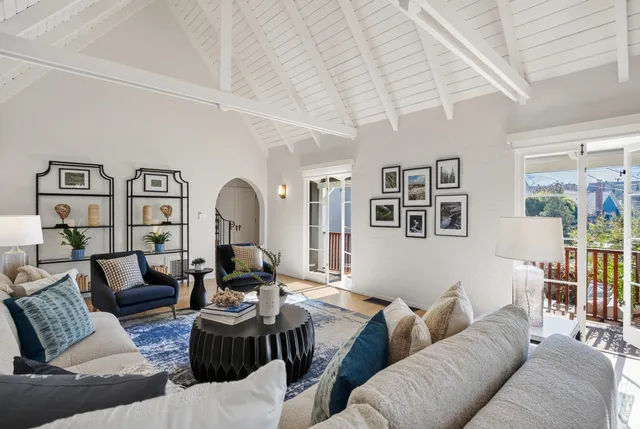 a kitchen with a stove and a refrigerator