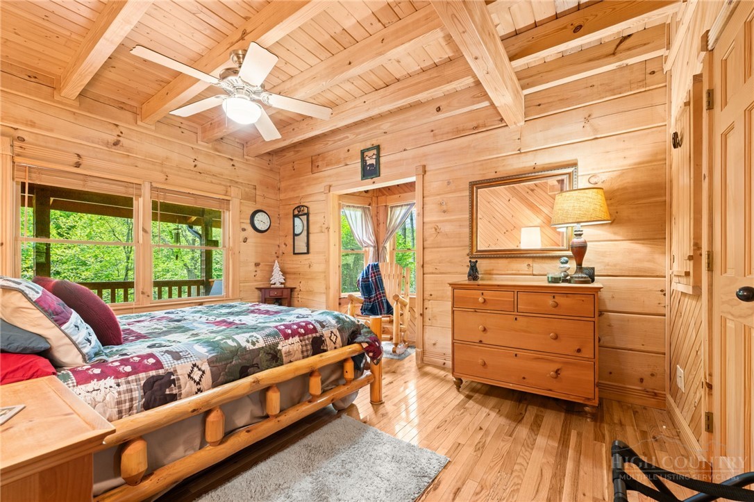613 Silas Creek Road Lansing, NC 28643 - Photo 30 of 40 a bed room with a bed and a window