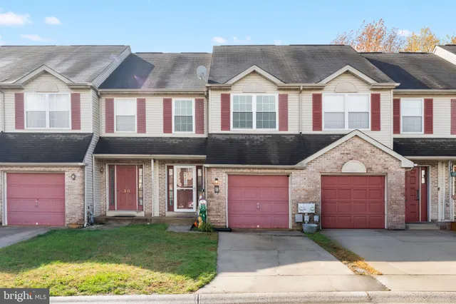 a front view of residential houses