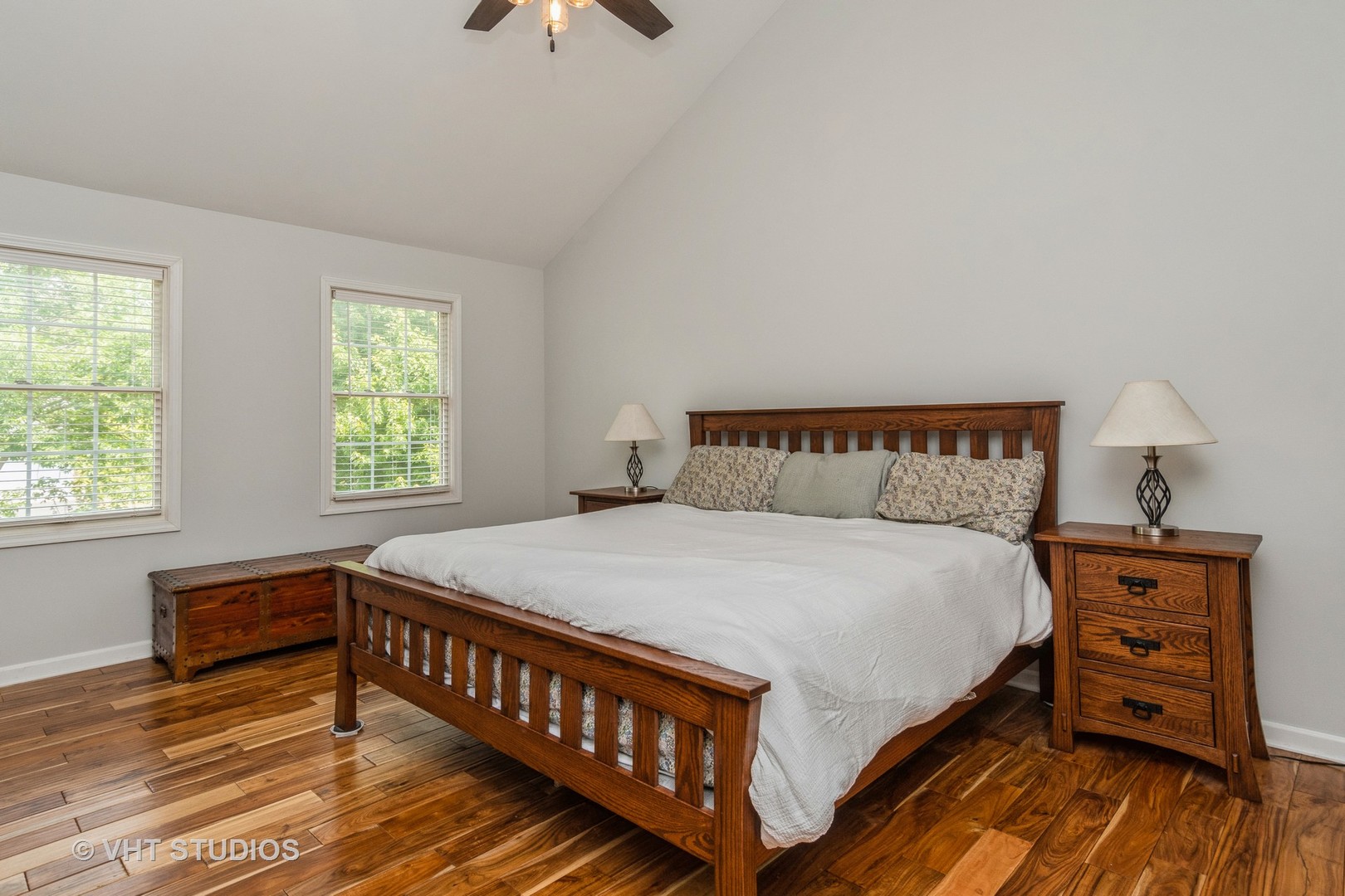 565 Boardman Circle Bolingbrook, IL 60440 - Photo 11 of 24 a bedroom with a bed and wooden floor