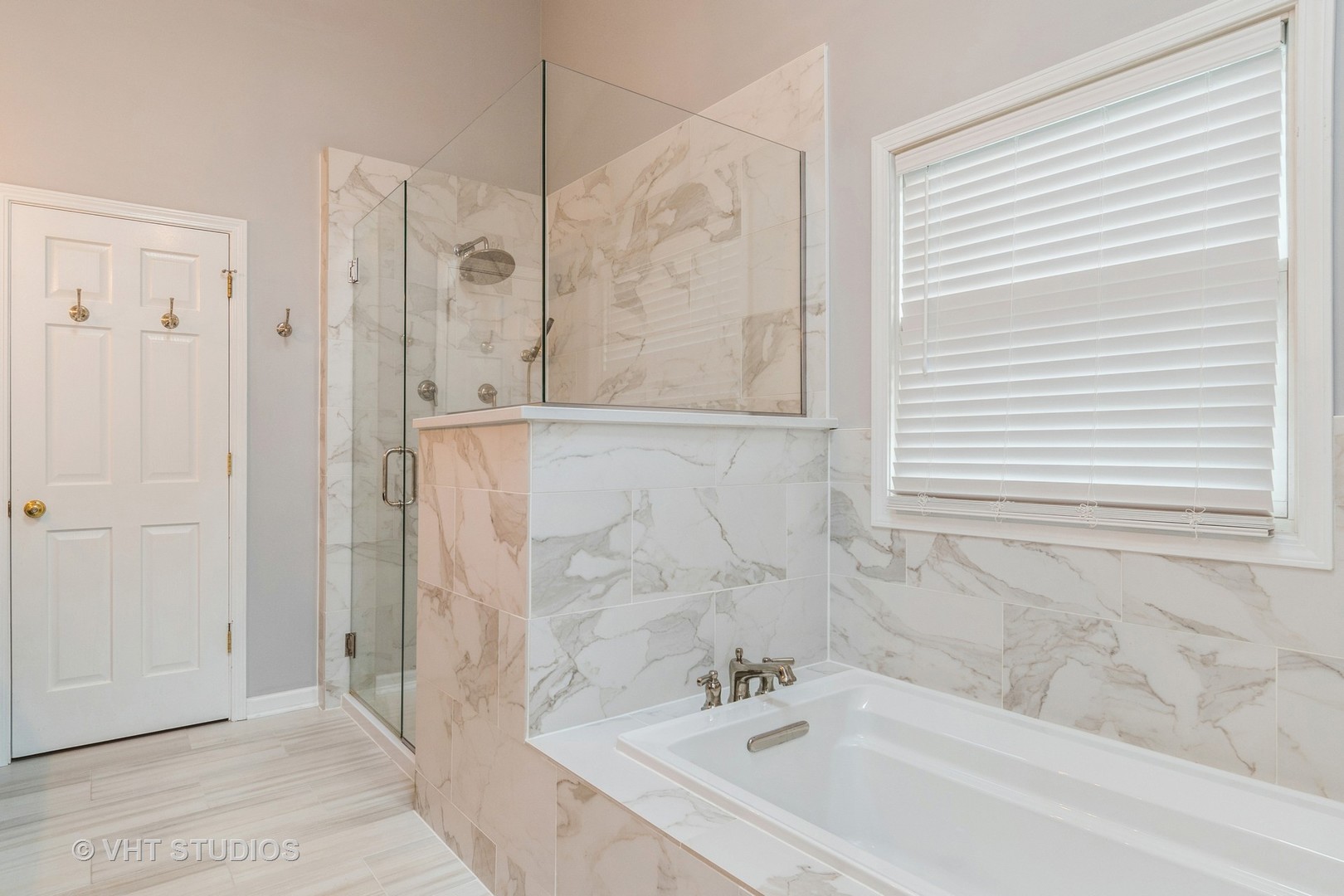 565 Boardman Circle Bolingbrook, IL 60440 - Photo 13 of 24 a bathroom with a bathtub and a shower