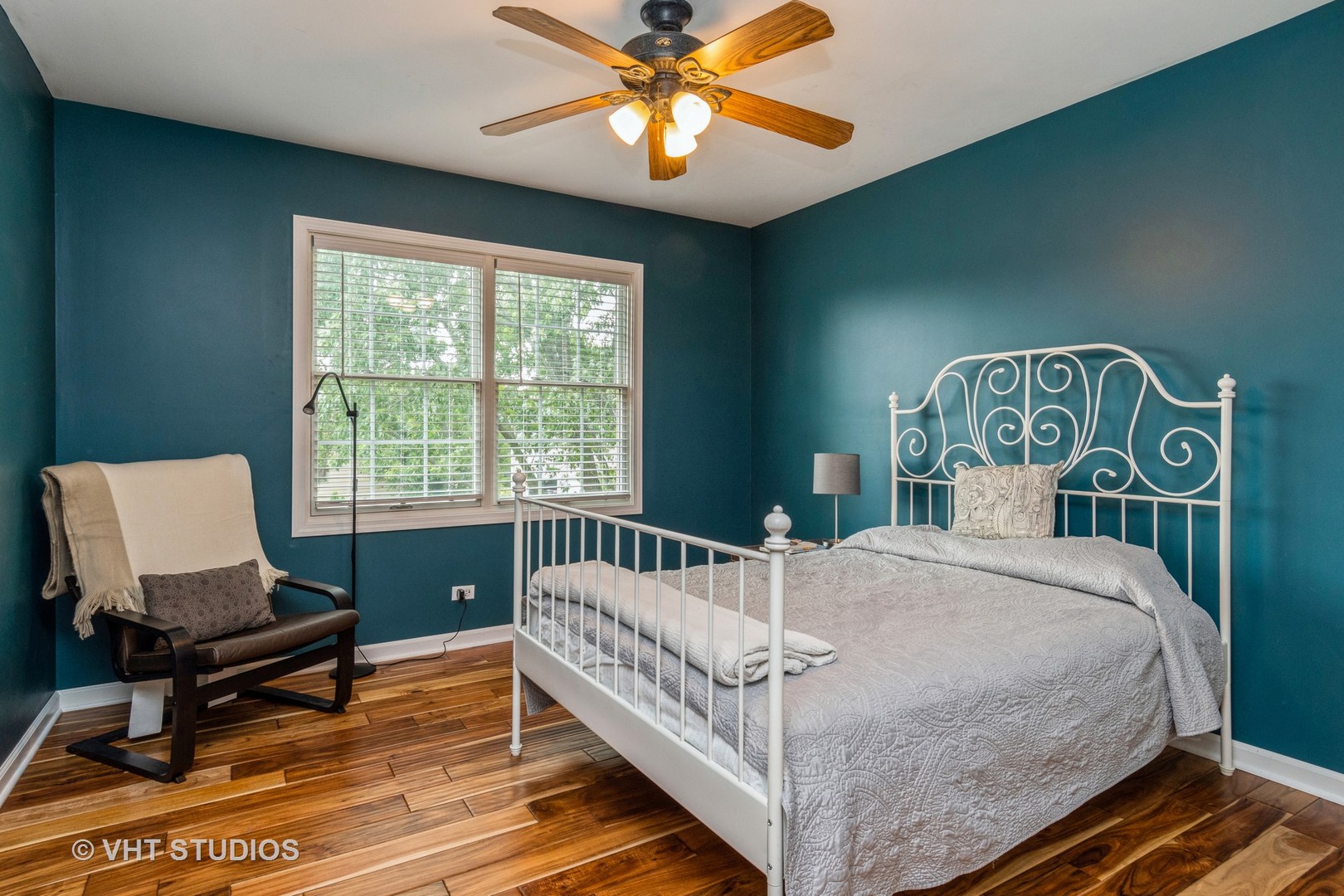 565 Boardman Circle Bolingbrook, IL 60440 - Photo 16 of 24 a bed sitting in a bedroom next to a window