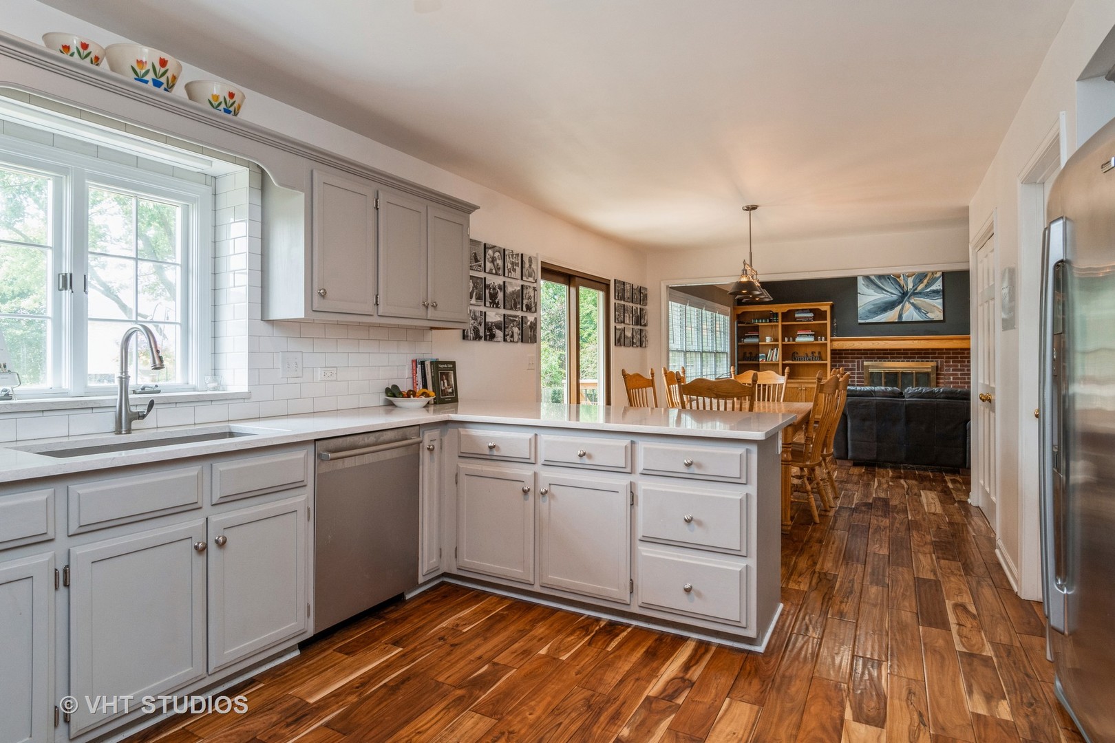 565 Boardman Circle Bolingbrook, IL 60440 - Photo 5 of 24 a kitchen with a sink window and cabinets