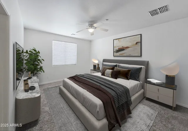 a bedroom with bed and window