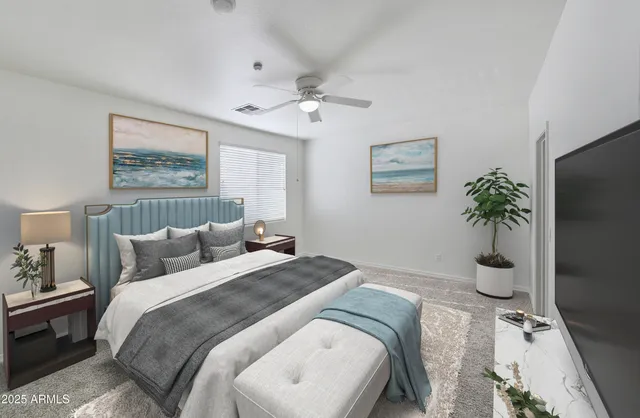 a bedroom with bed furniture and a window