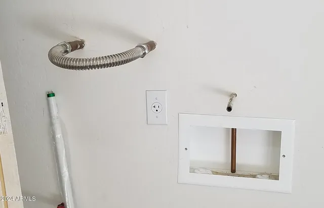 a picture of a wall with a mirror