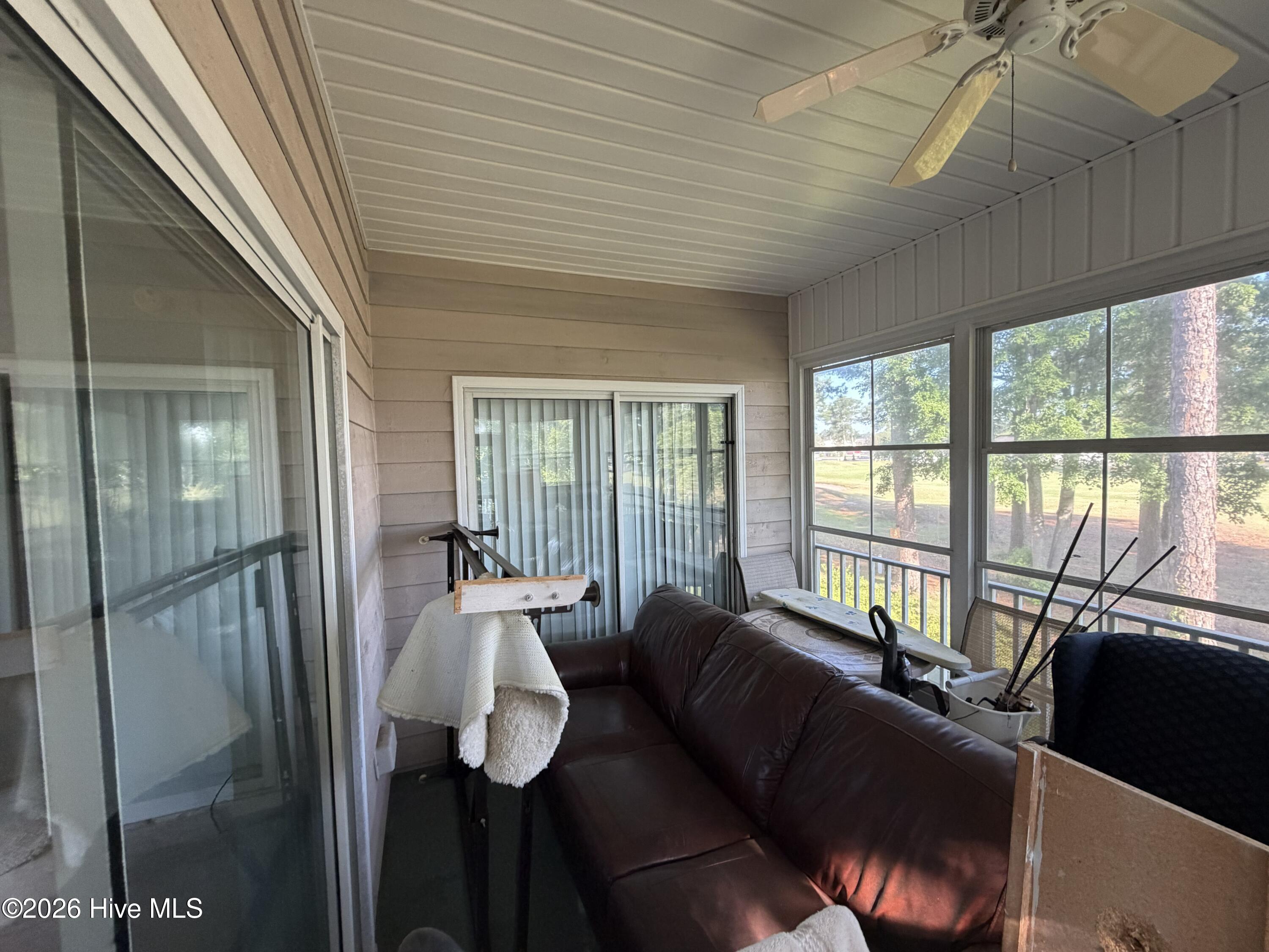 116 Rice Mill Circle, Unit 4 Sunset Beach, NC 28468 - Photo 23 of 29 Screened porch.