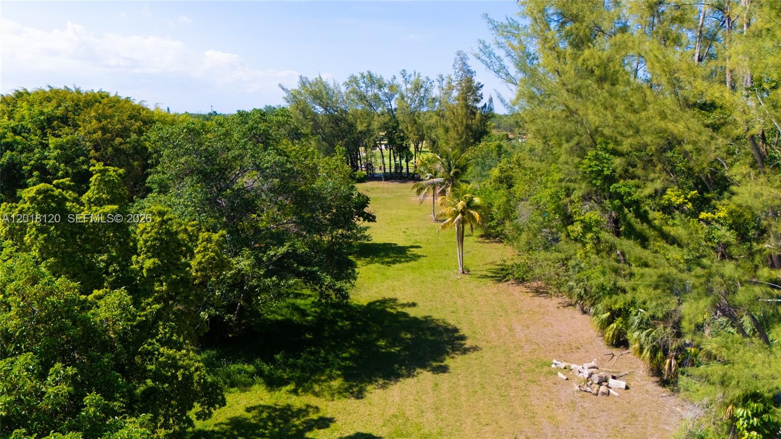 9840 Southwest 104th Street Miami, FL 33176 - Photo 25 of 34 a view of a lake with a yard