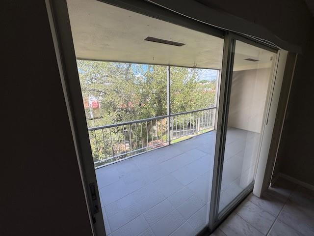 620 Northwest 13th Street, Unit 37 Boca Raton, FL 33486 - Photo 15 of 17 a view of a glass door and the balcony