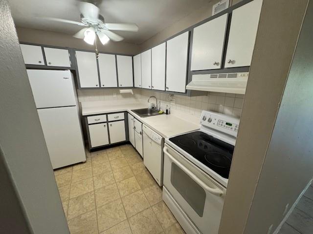 620 Northwest 13th Street, Unit 37 Boca Raton, FL 33486 - Photo 4 of 17 a kitchen with stainless steel appliances a stove a sink and a refrigerator