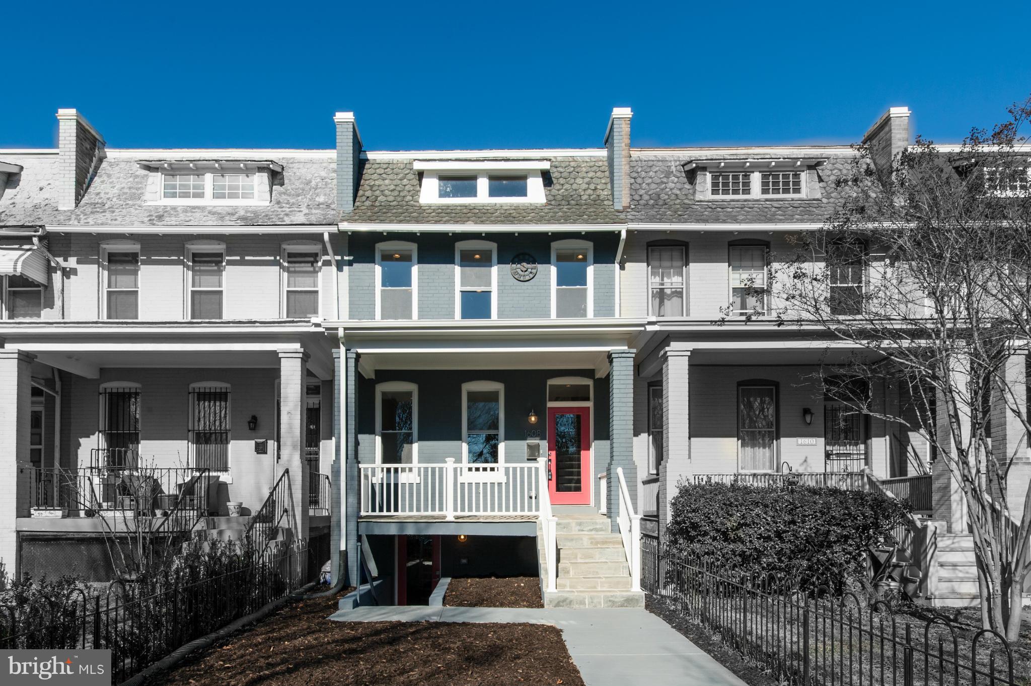 a front view of a building with balcony