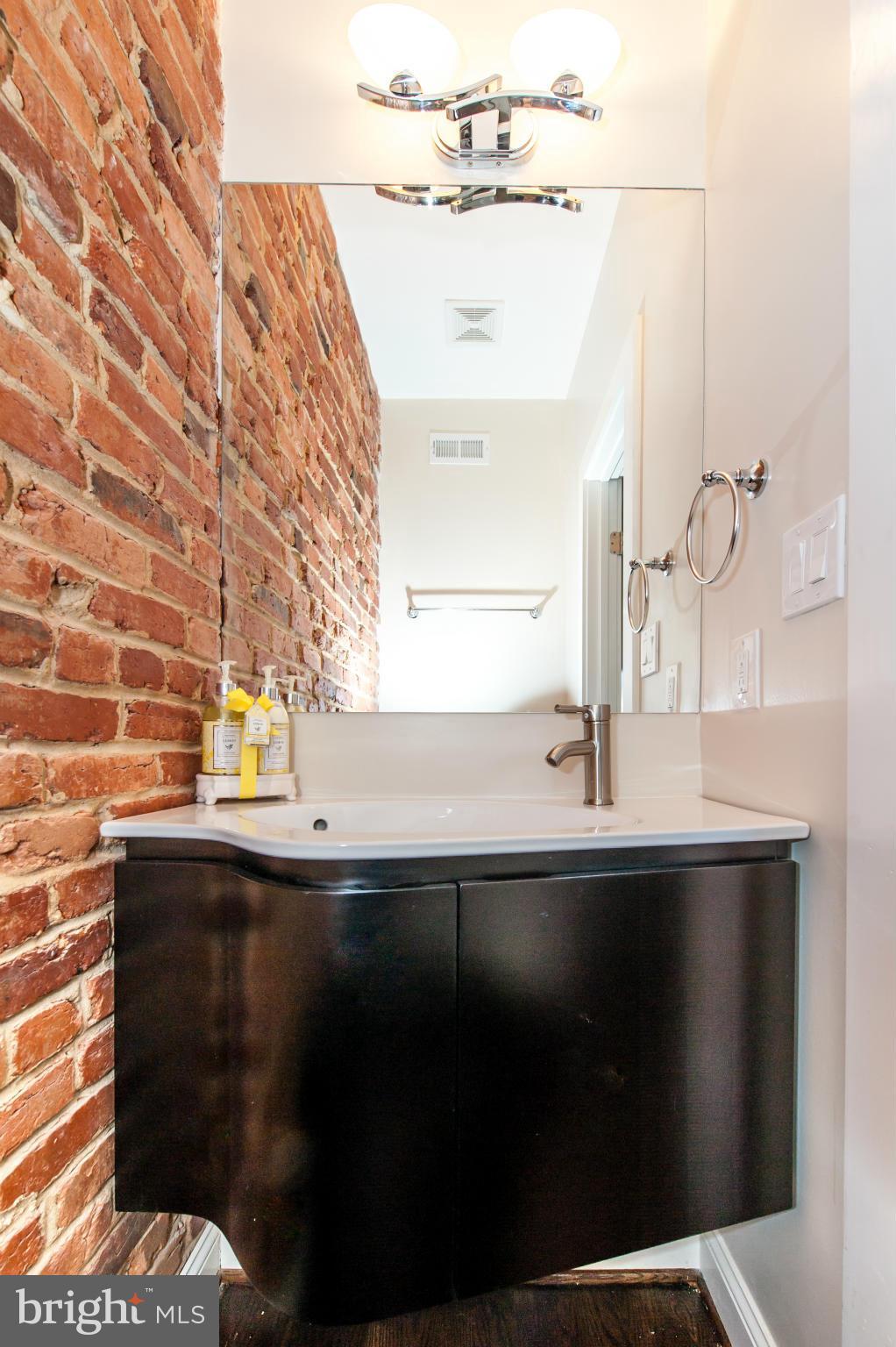 1608 Potomac Avenue Southeast Washington, DC 20003 - Photo 11 of 29 a close view of sink and mirror