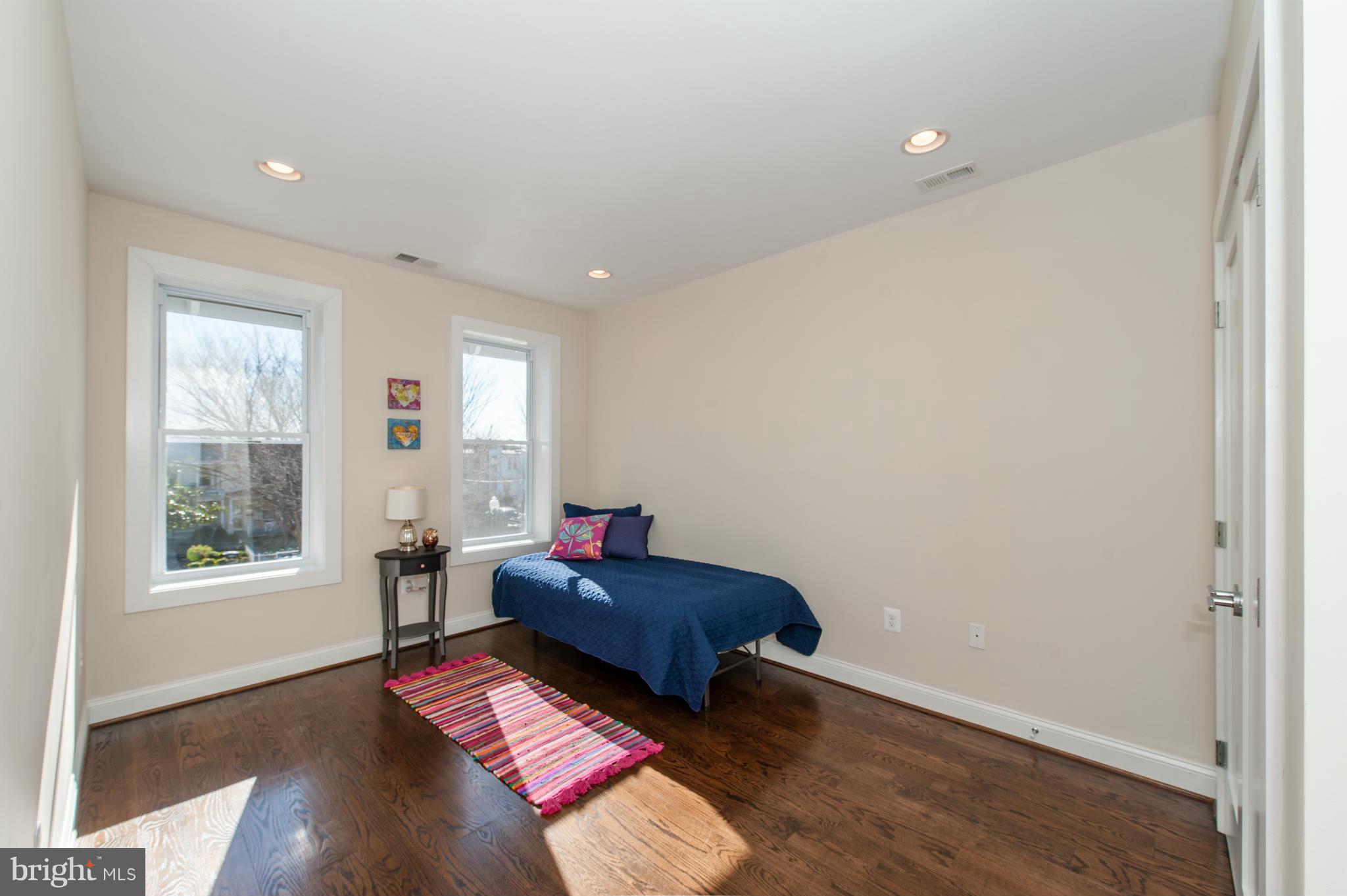 1608 Potomac Avenue Southeast Washington, DC 20003 - Photo 19 of 29 a living room with furniture and a window