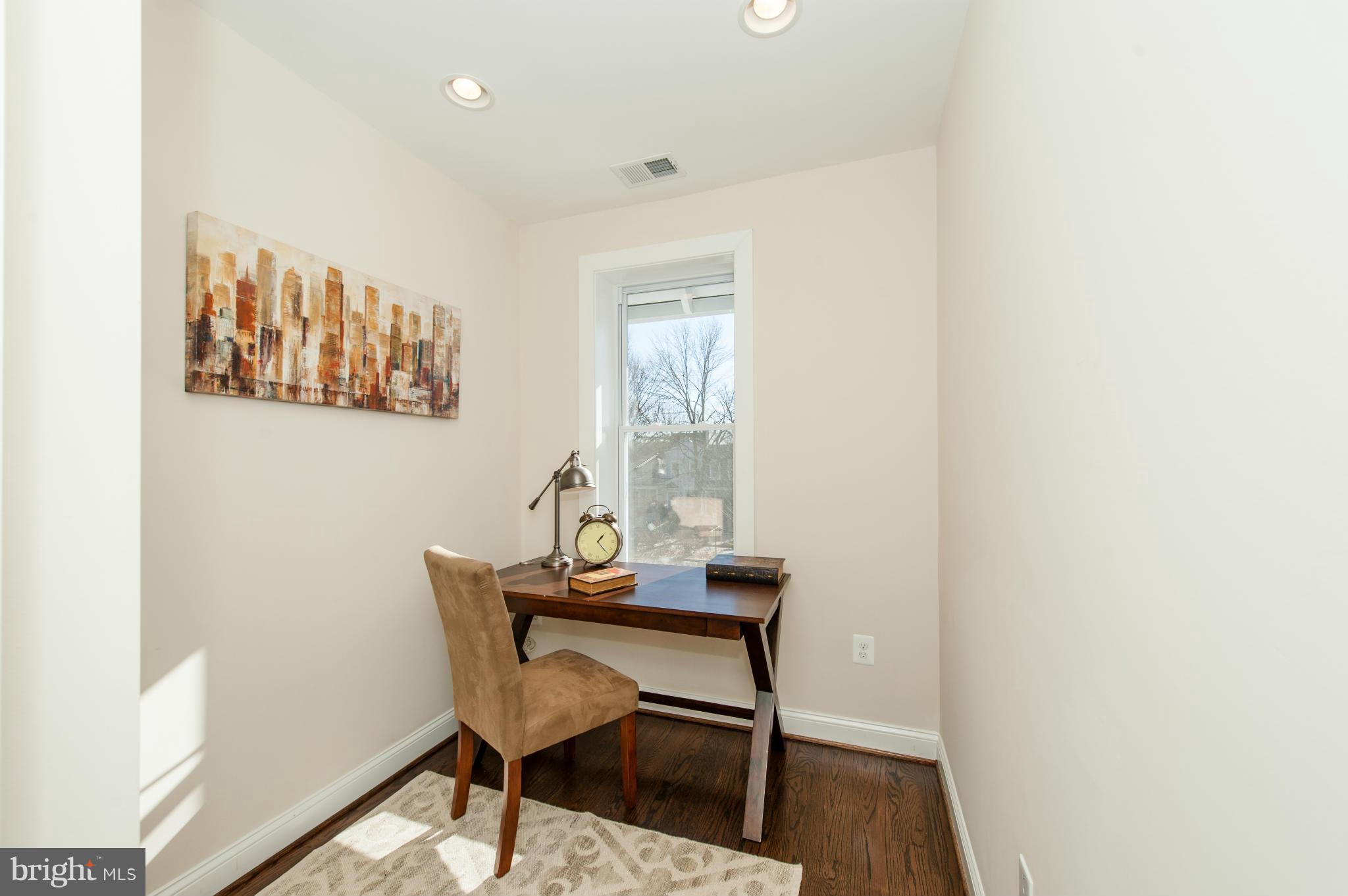 1608 Potomac Avenue Southeast Washington, DC 20003 - Photo 20 of 29 a room with furniture and a window