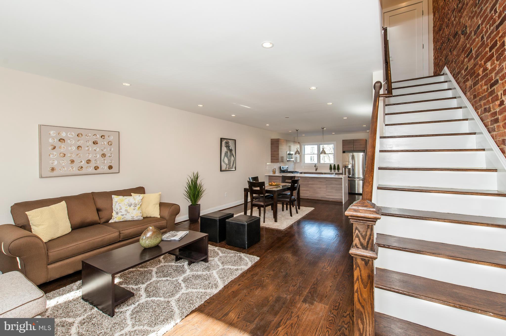1608 Potomac Avenue Southeast Washington, DC 20003 - Photo 3 of 29 a living room with furniture and wooden floor