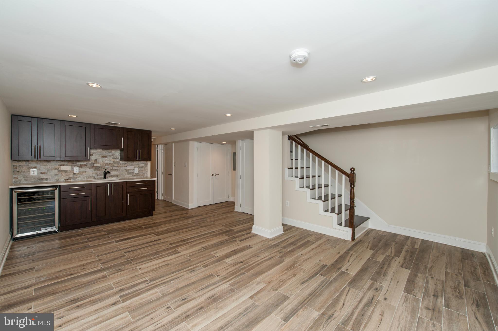 1608 Potomac Avenue Southeast Washington, DC 20003 - Photo 22 of 29 a view of kitchen with sink microwave and cabinets