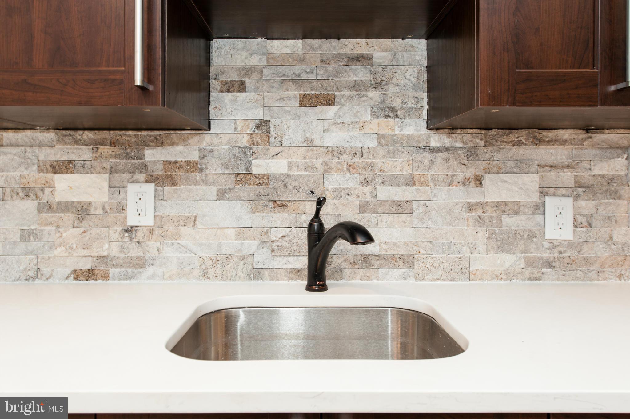 1608 Potomac Avenue Southeast Washington, DC 20003 - Photo 23 of 29 a close view of sink and tap