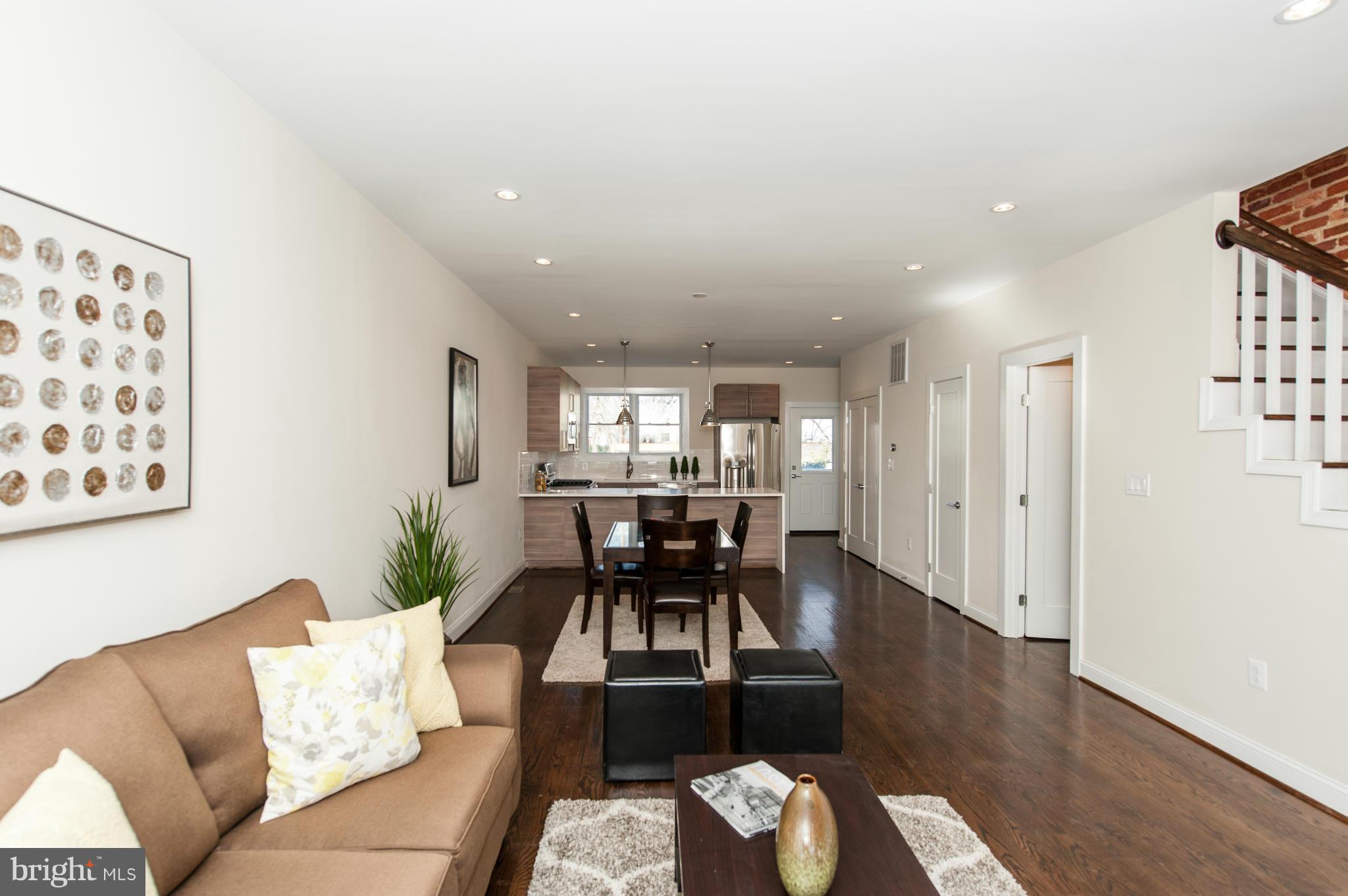 1608 Potomac Avenue Southeast Washington, DC 20003 - Photo 9 of 29 a living room with furniture and view of kitchen