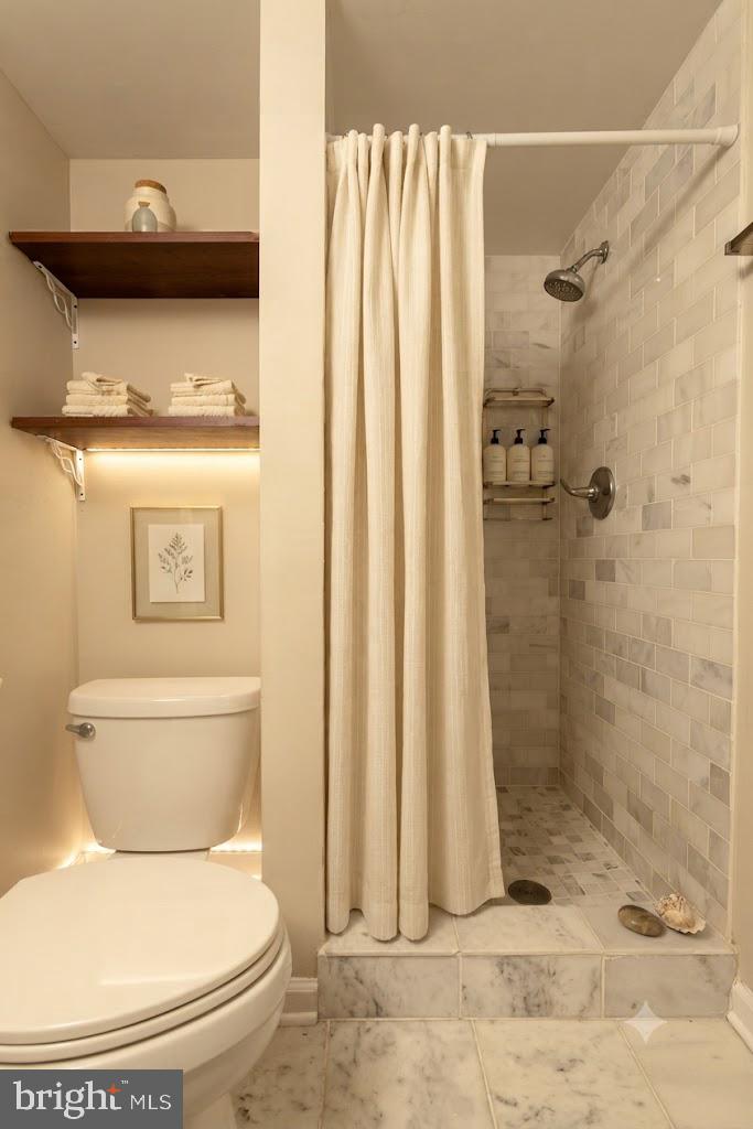 6034 Chesterbrook Road, Unit B McLean, VA 22101 - Photo 25 of 34 Modern bathroom with elegant finishes.