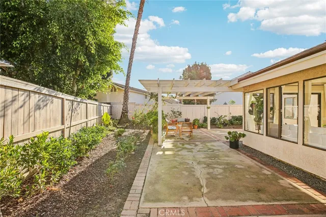 a view of a chairs and tables in the patio