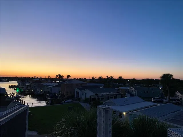 a view of a lake and a yard