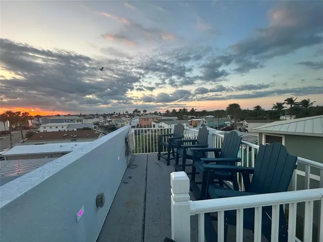 a view of a balcony with city view