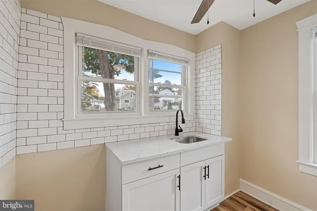a bathroom with a sink and a vanity