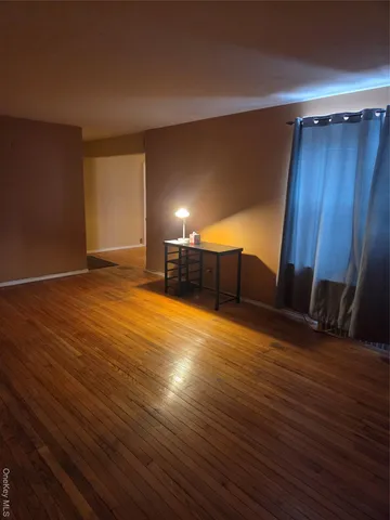 a kitchen with granite countertop stainless steel appliances a stove a microwave and cabinets