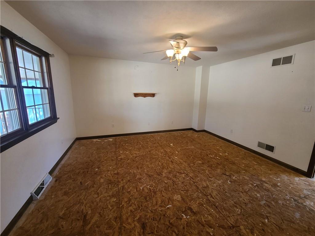 437 Pittsburgh Road Rochester, PA 15074 - Photo 11 of 25 wooden floor in an empty room with a window