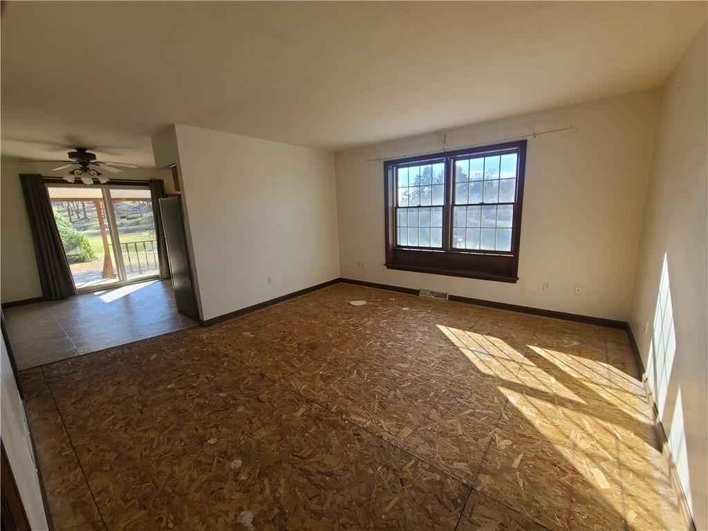437 Pittsburgh Road Rochester, PA 15074 - Photo 16 of 25 a view of an empty room with a window