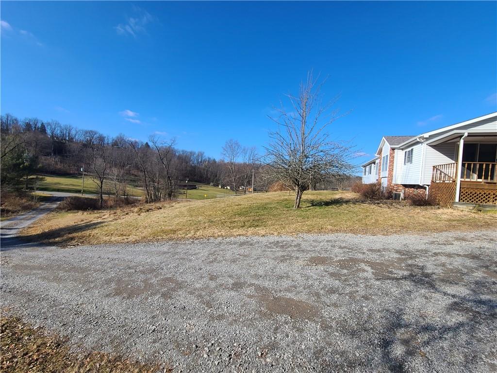 437 Pittsburgh Road Rochester, PA 15074 - Photo 2 of 25 a view of a yard with an house