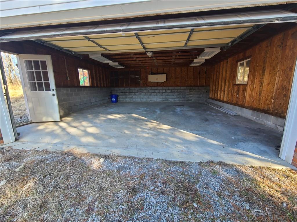 437 Pittsburgh Road Rochester, PA 15074 - Photo 6 of 25 a view of a room with wooden walls