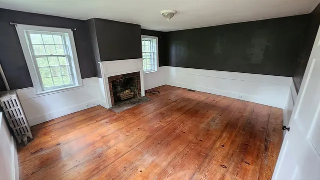 a view of a livingroom with a fireplace