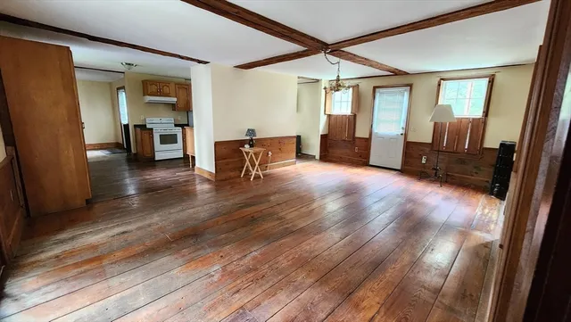 a view of livingroom with furniture and wooden floor