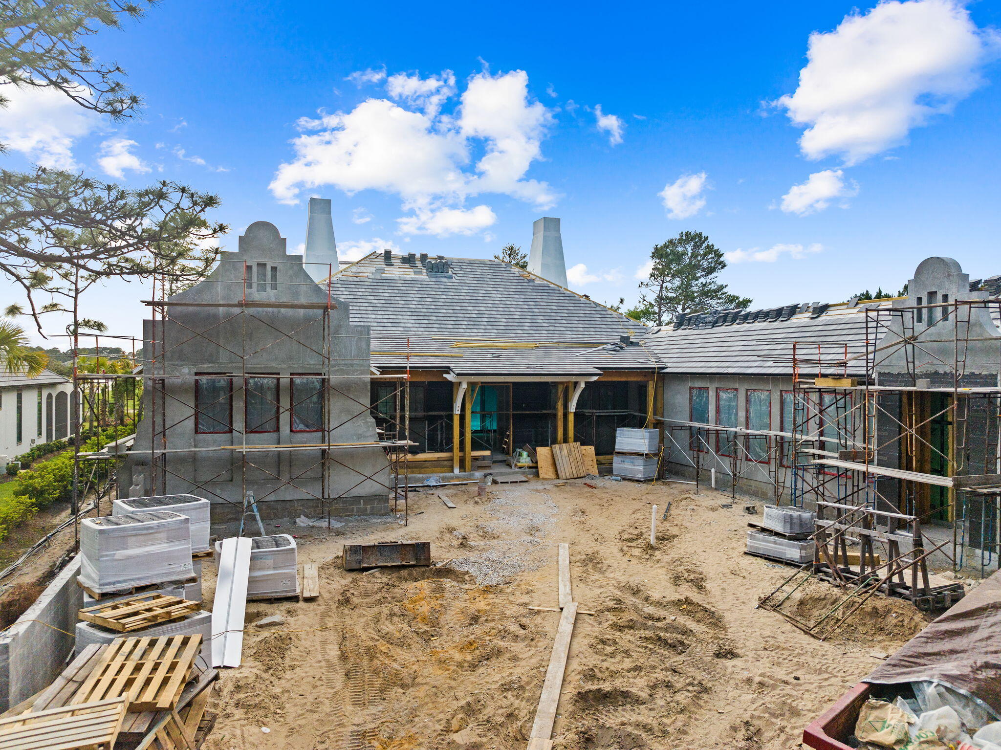 2938 Pine Valley Road Miramar Beach, FL 32550 - Photo 6 of 35 a front view of a house with a yard and seating space