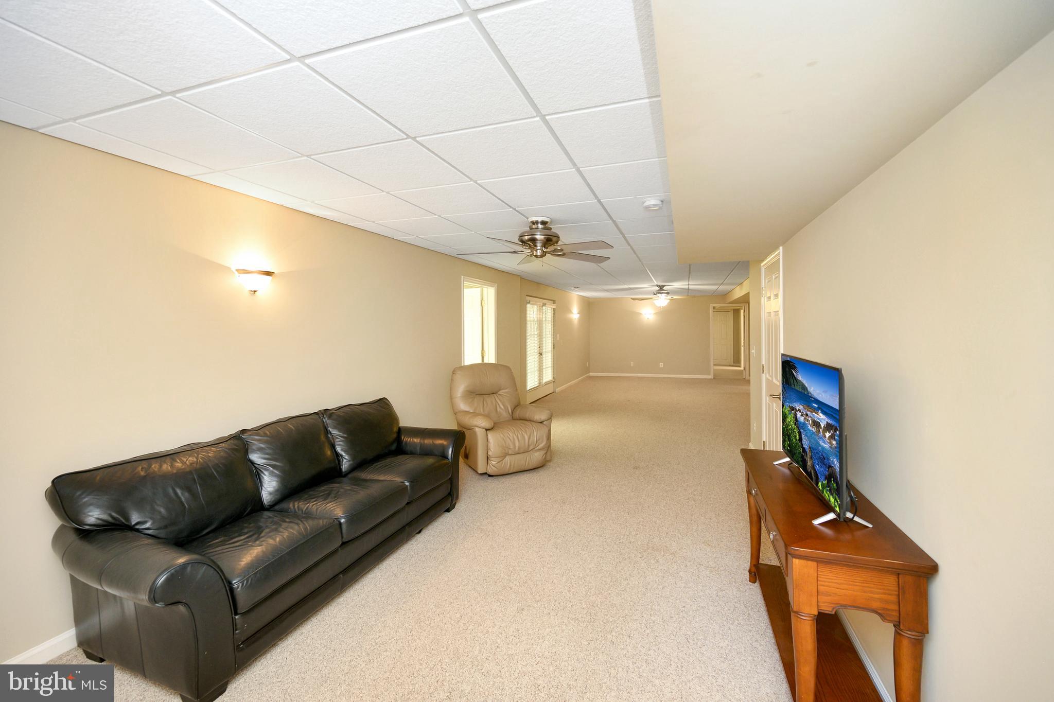 103 Spotswood Road Locust Grove, VA 22508 - Photo 17 of 36 Lower level family room