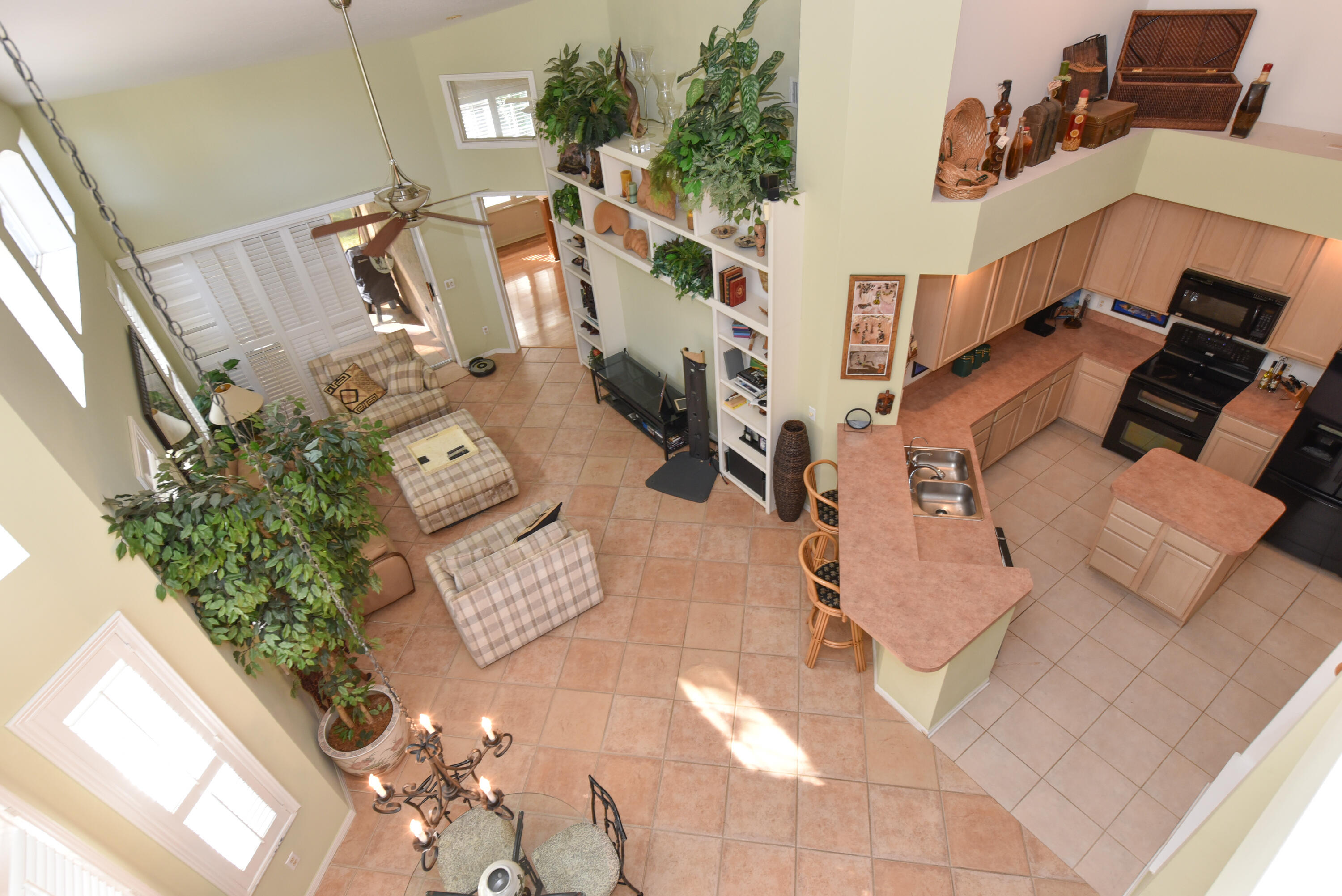 1567 Southwest Harbour Isles Circle, Unit 65 St. Lucie West, FL 34986 - Photo 22 of 35 an aerial view of a house with a yard