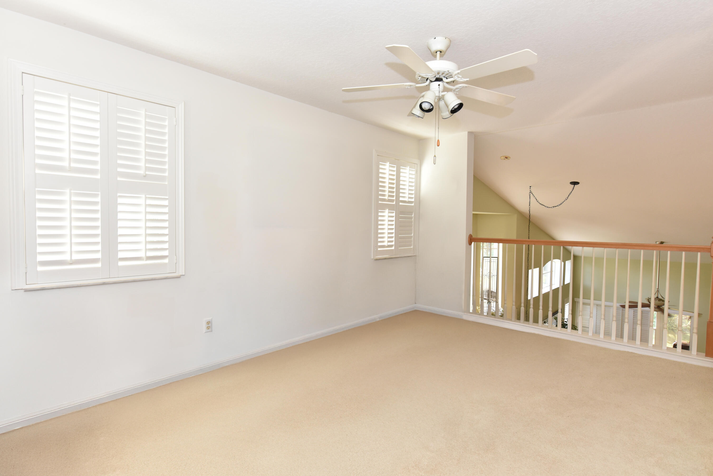 1567 Southwest Harbour Isles Circle, Unit 65 St. Lucie West, FL 34986 - Photo 24 of 35 a view of an empty room with a window