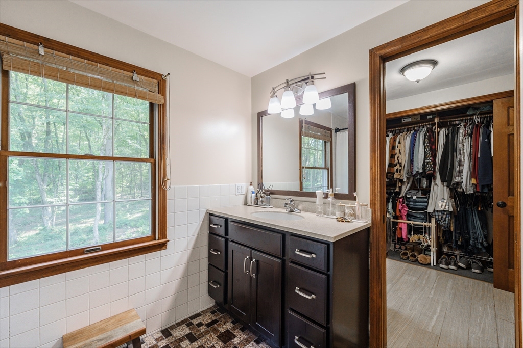 36 Old House Road Montgomery, MA 01085 - Photo 18 of 42 a bathroom with a sink and a mirror