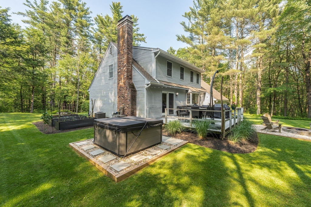 36 Old House Road Montgomery, MA 01085 - Photo 31 of 42 a view of a house with a yard patio and sitting area