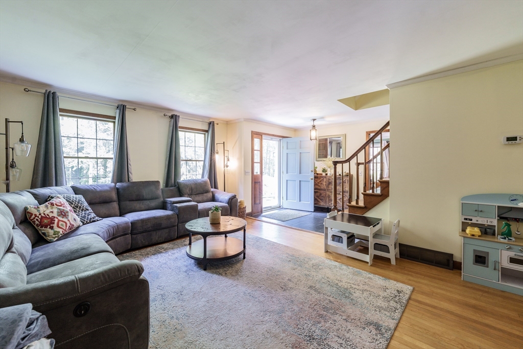 36 Old House Road Montgomery, MA 01085 - Photo 8 of 42 a living room with furniture and a flat screen tv