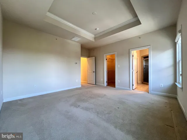 a view of empty room with windows