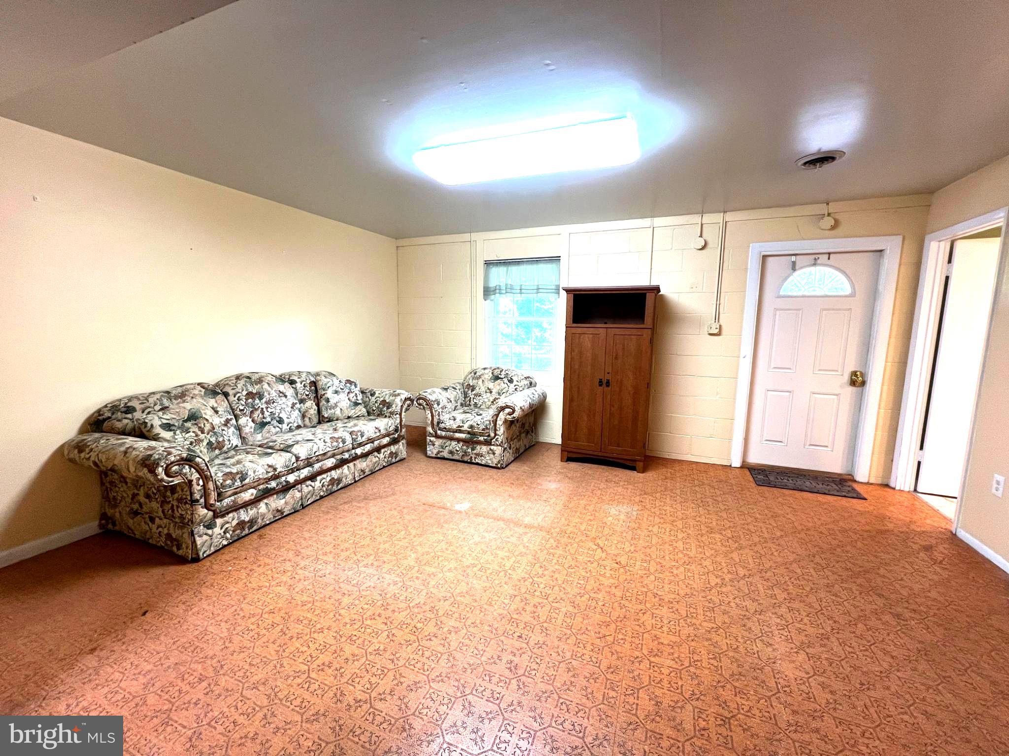 8531 Solomons Island Road North Owings, MD 20736 - Photo 27 of 35 Spacious living area with natural light.